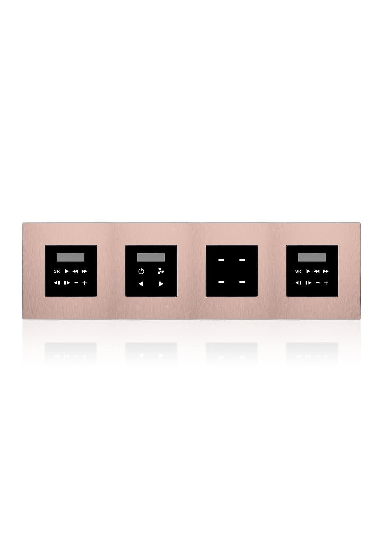 A rose gold quad wall plate combining media controls, climate and a power outlet